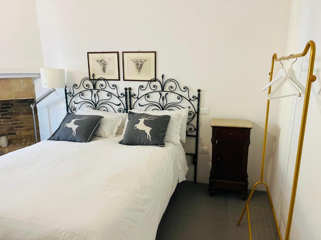 Posteľ alebo postele v izbe v ubytovaní B&B La Terrazza Sul Borgo