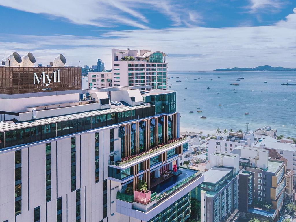 an aerial view of a city with the ocean at Mytt Hotel Pattaya - SHA Extra Plus in Pattaya
