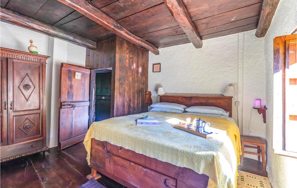 A bed or beds in a room at Cottage Ginestre