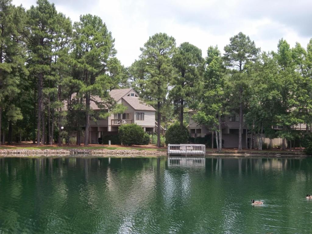 a house on the shore of a lake at Sandcastle Cove in New Bern