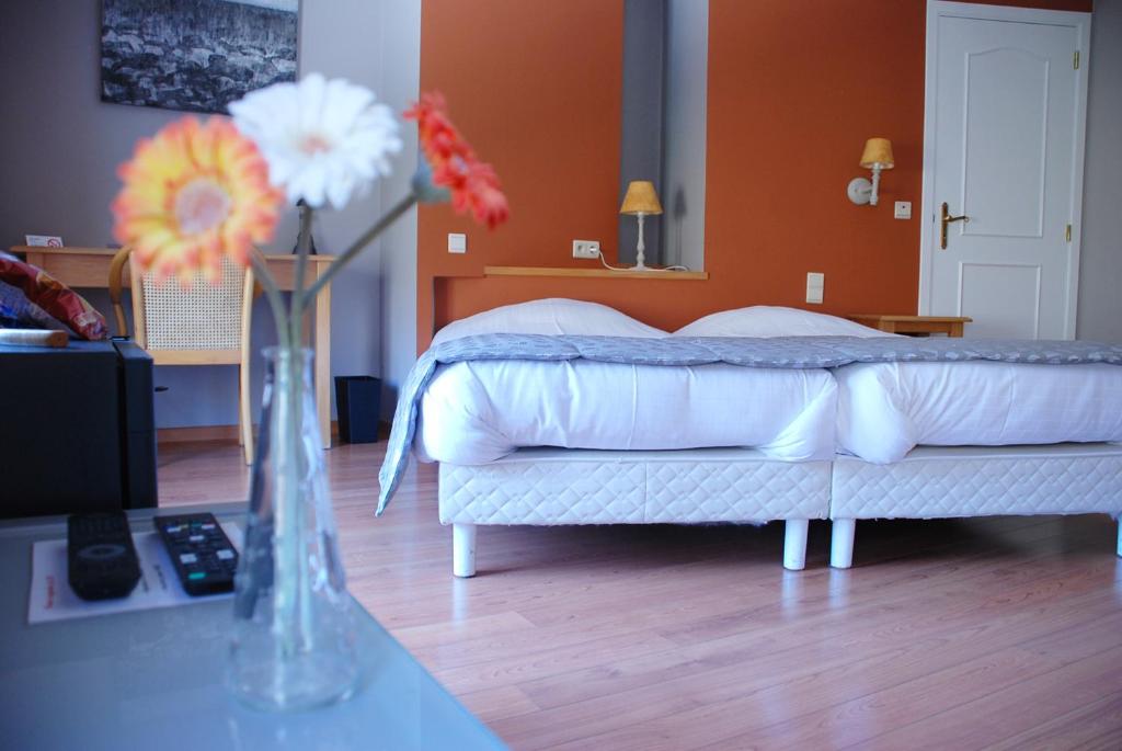 Letto o letti in una camera di Hotel De Franc Bois