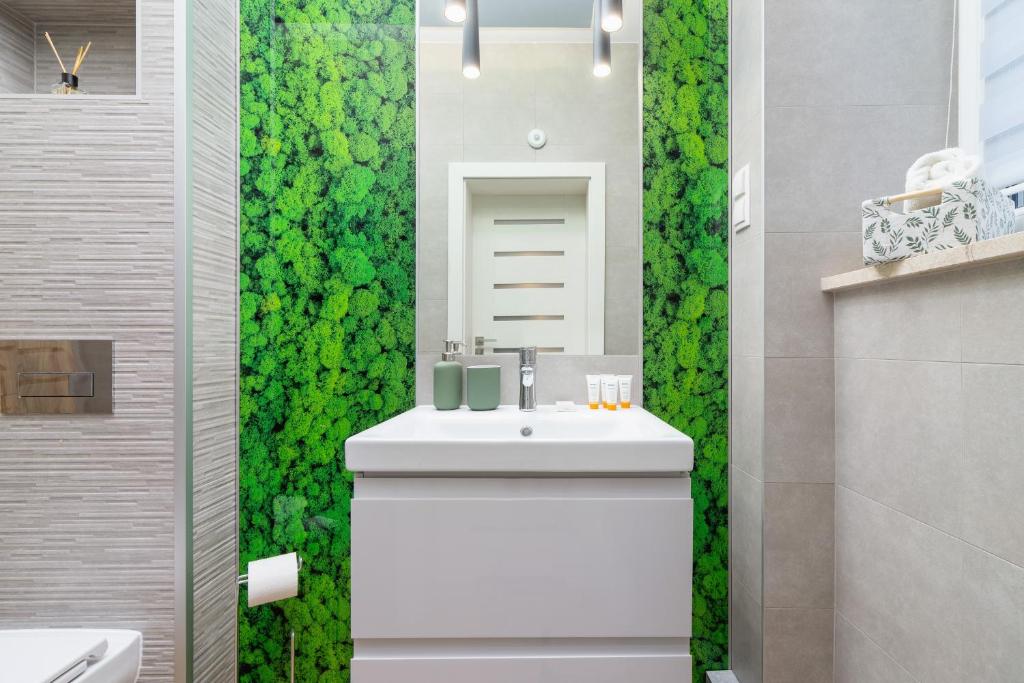 Kúpeľňa v ubytovaní Kraków Trendy Studio Apartments by Noclegi Renters