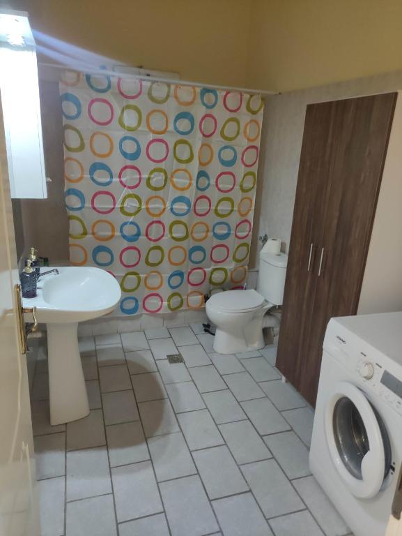 Koupelna v ubytování GCM 1 ROOMS kentro k parking