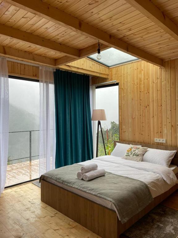 Postel nebo postele na pokoji v ubytování Lemanor lodge - Mountain cottages in Georgia