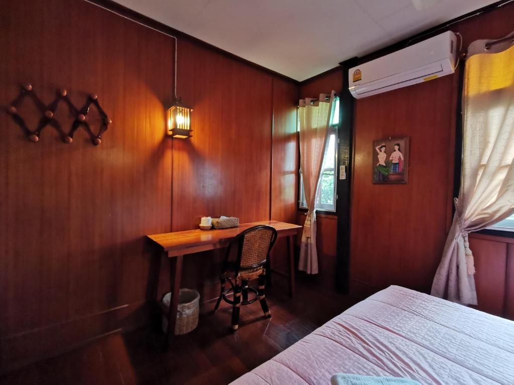 Postel nebo postele na pokoji v ubytování TAVEE Guesthouse