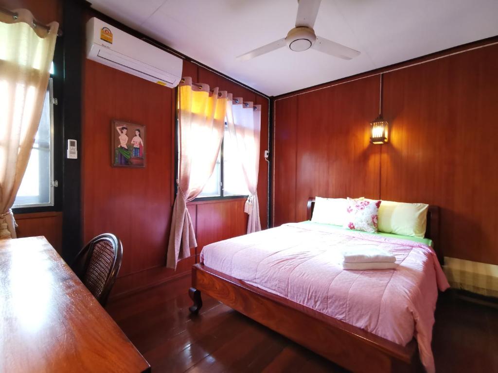 Postel nebo postele na pokoji v ubytování TAVEE Guesthouse