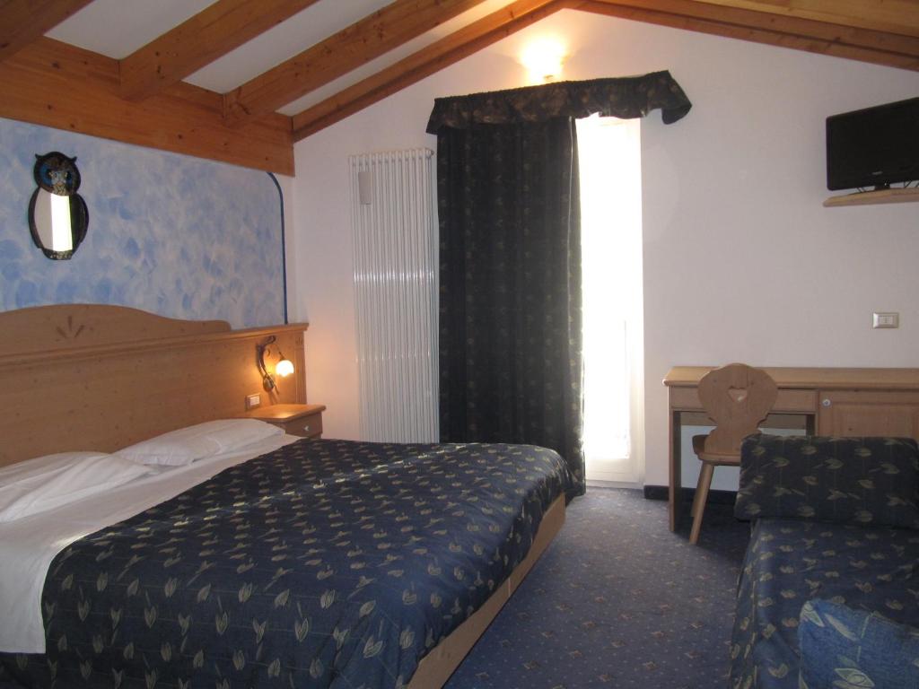 Postel nebo postele na pokoji v ubytování Hotel Garni Relax