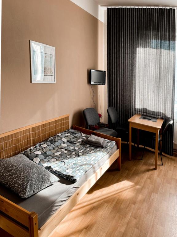 Postel nebo postele na pokoji v ubytování JP ubytování Loštice