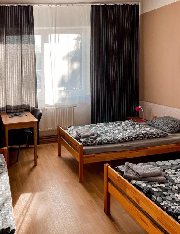 Postel nebo postele na pokoji v ubytování JP ubytování Loštice