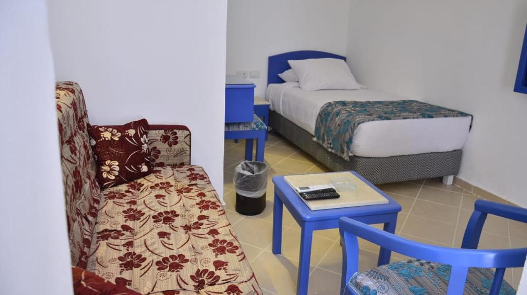 Postel nebo postele na pokoji v ubytování Kanabesh Village
