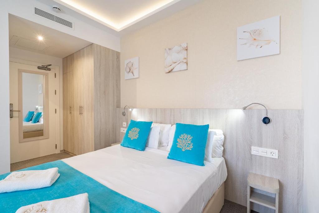 Postel nebo postele na pokoji v ubytování Hotel Soul de Javea