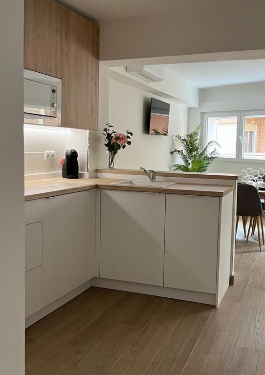 Kuchyň nebo kuchyňský kout v ubytování Apartamento Turístico Clavellinas IV