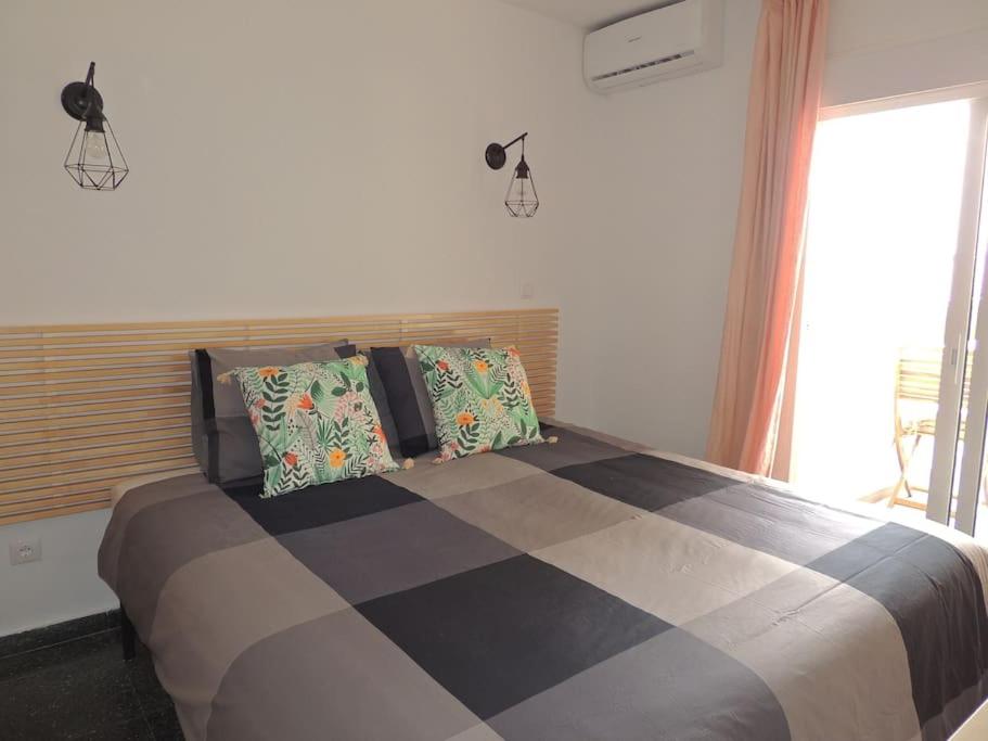 Posteľ alebo postele v izbe v ubytovaní Puertosol 74 Beach Playa