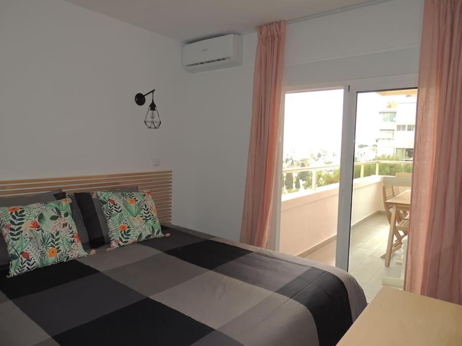 Posteľ alebo postele v izbe v ubytovaní Puertosol 74 Beach Playa