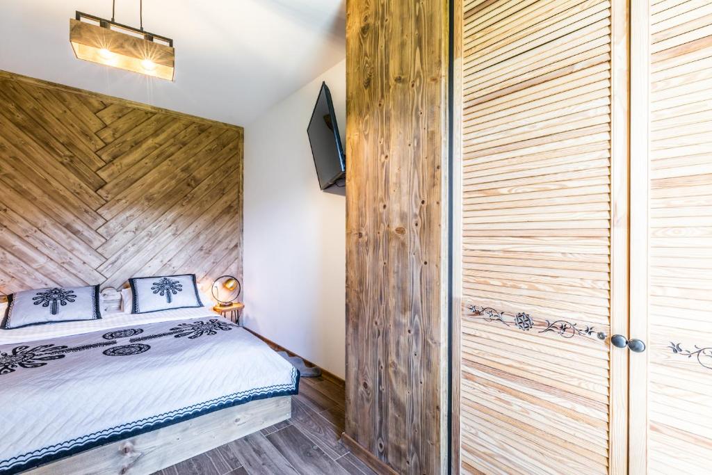 Posteľ alebo postele v izbe v ubytovaní Apartament Butorowy Wierch