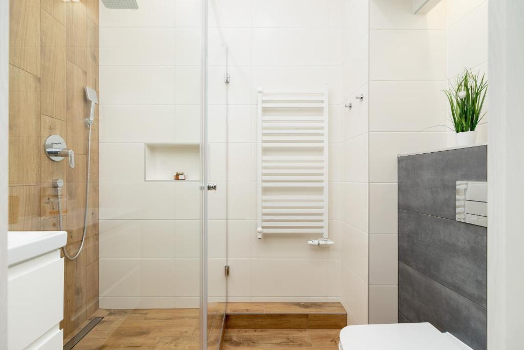 Kúpeľňa v ubytovaní Kraków Trendy Studio Apartments by Noclegi Renters