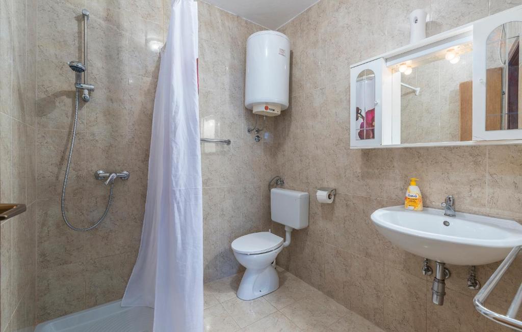 Koupelna v ubytování Apartments Nusha
