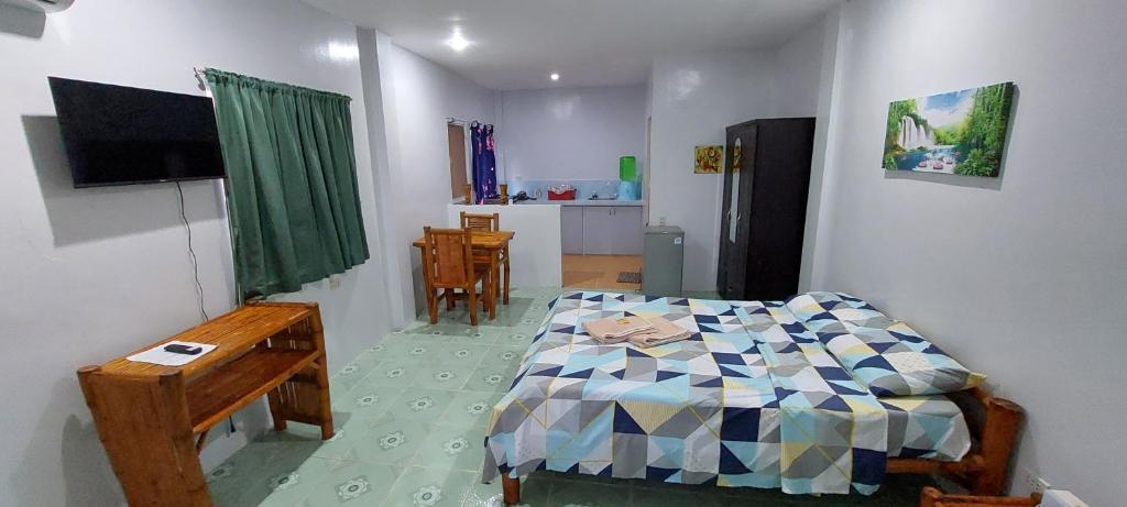 TV a/nebo společenská místnost v ubytování Genna's Tourist Inn Santa Fe