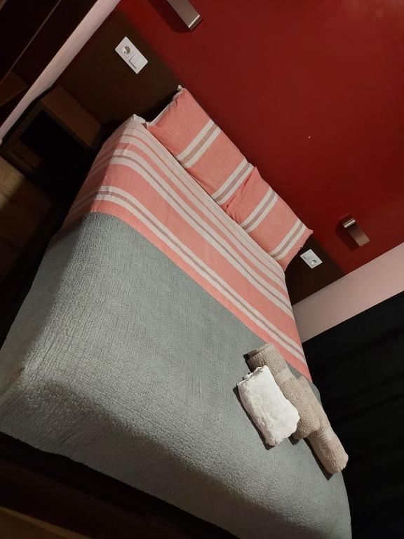 Cama o camas de una habitación en Hostal Corazón de Madrid