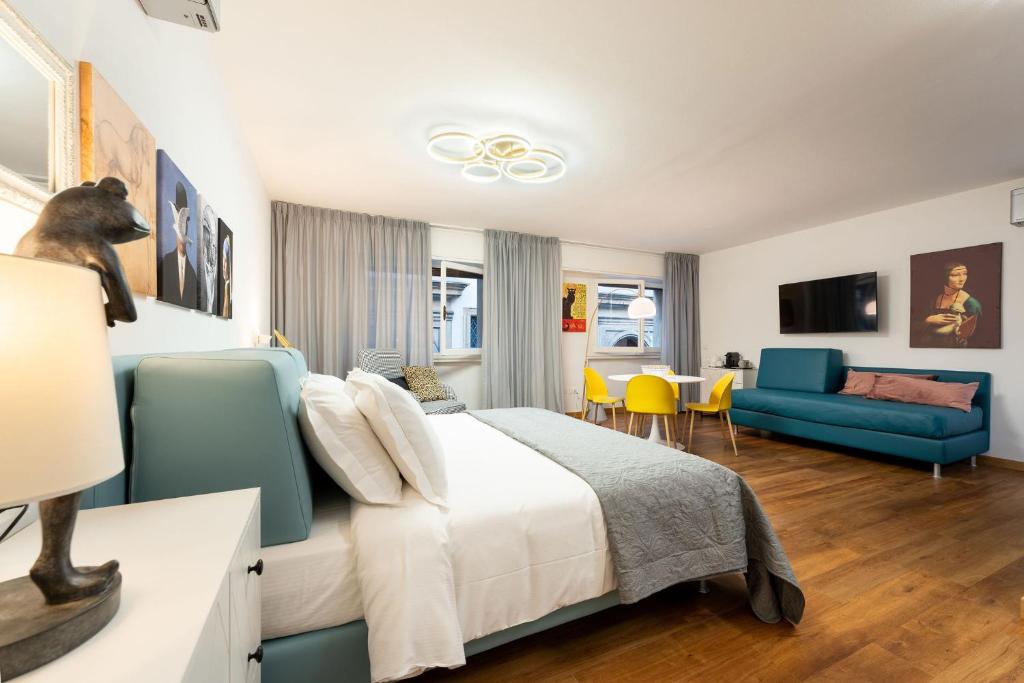 Łóżko lub łóżka w pokoju w obiekcie Guicciardini Apartment