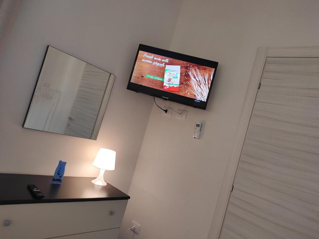 Telewizja i/lub zestaw kina domowego w obiekcie HOME DOLCE LUNA