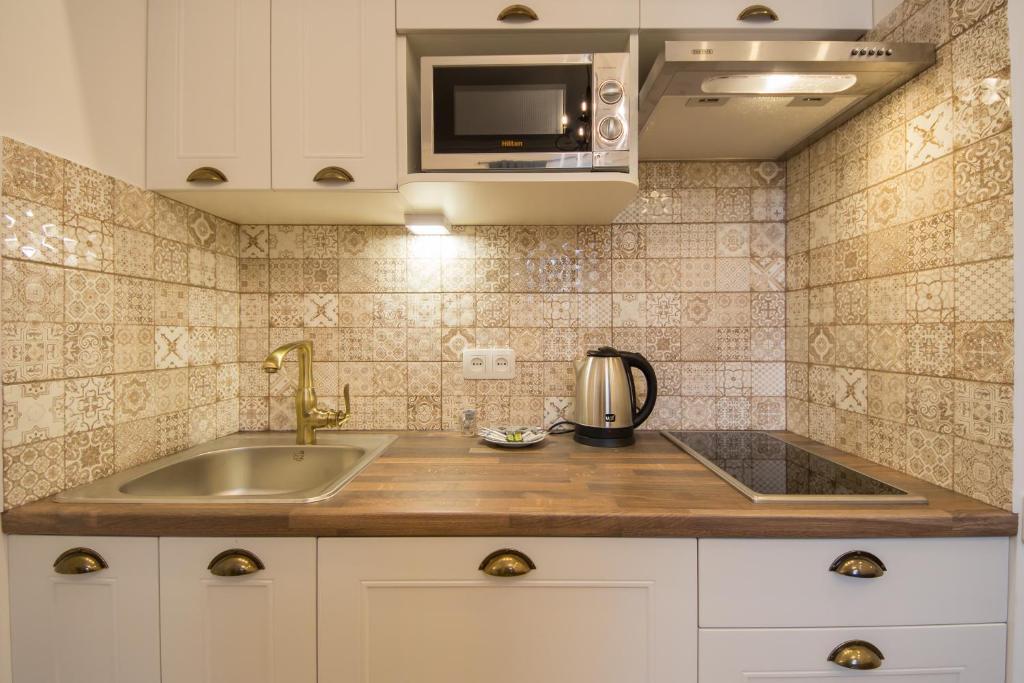 Central Apartments Palats Sportu Area фото 7