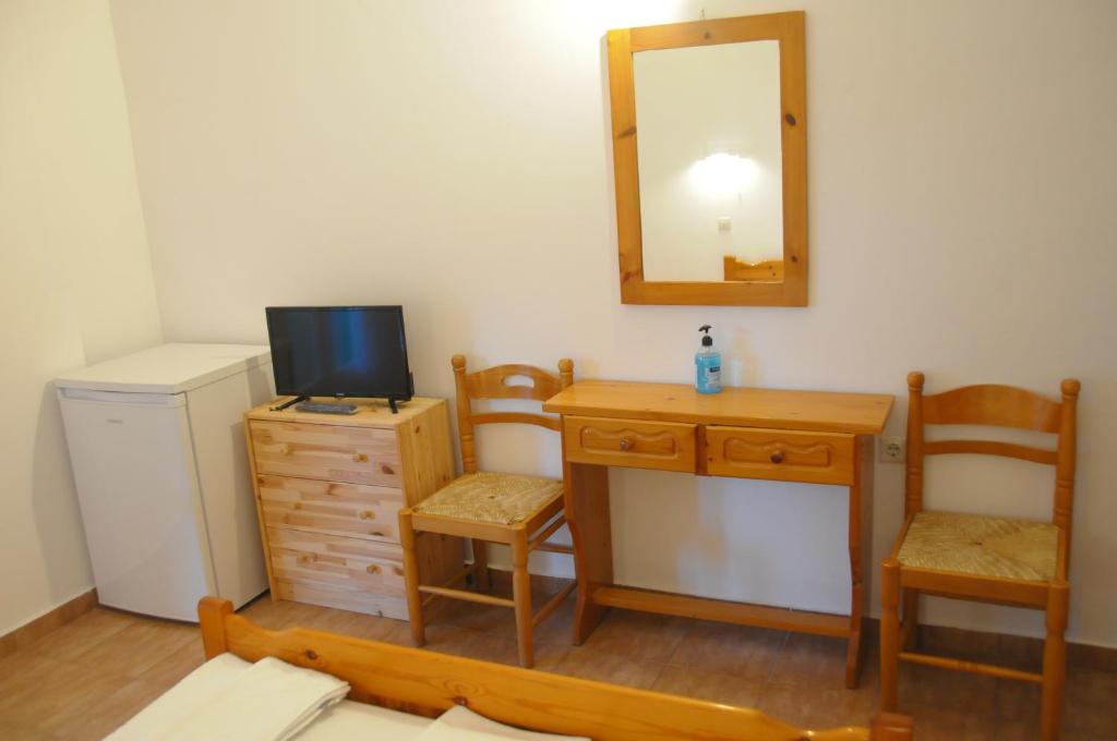 TV a/nebo společenská místnost v ubytování Chalikias Rooms