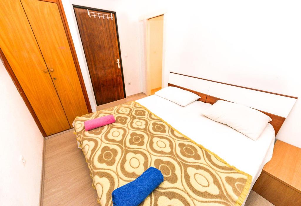 Postel nebo postele na pokoji v ubytování Apartments Brezovka