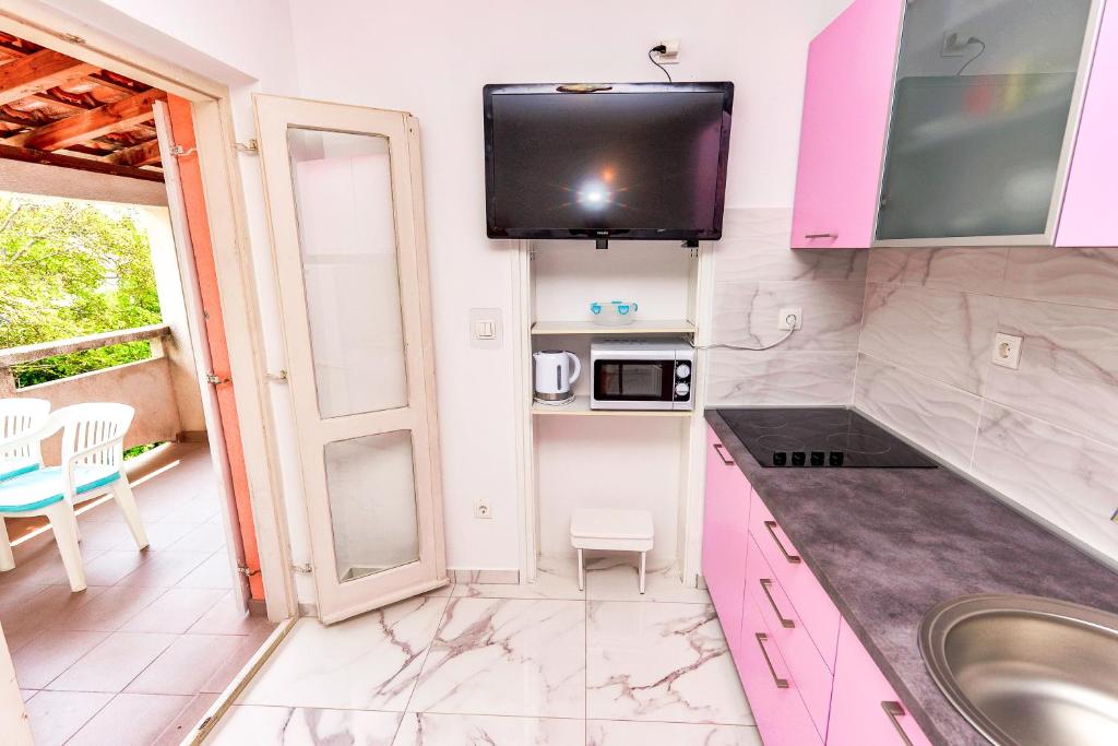 Kuchyň nebo kuchyňský kout v ubytování Apartments Brezovka