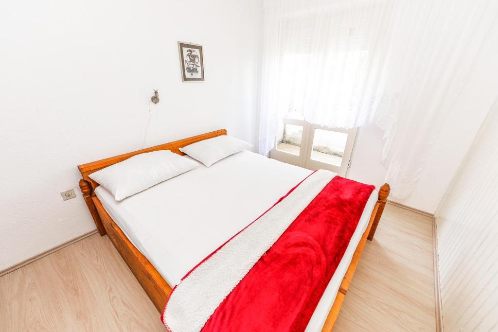 Postel nebo postele na pokoji v ubytování Apartments Brezovka