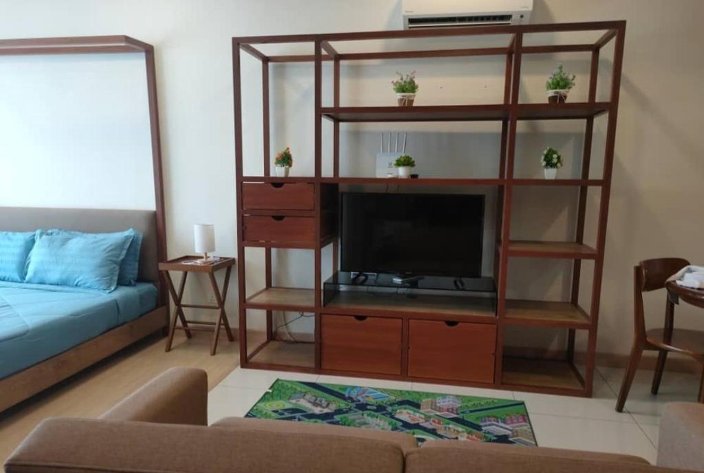 Posezení v ubytování PUTEH Timurbay Beachfront Private SEA view Suite Kuantan