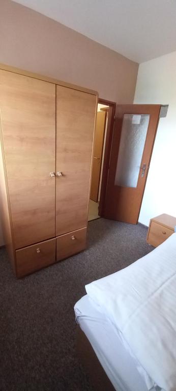 Postel nebo postele na pokoji v ubytování Expres Atack Penzion