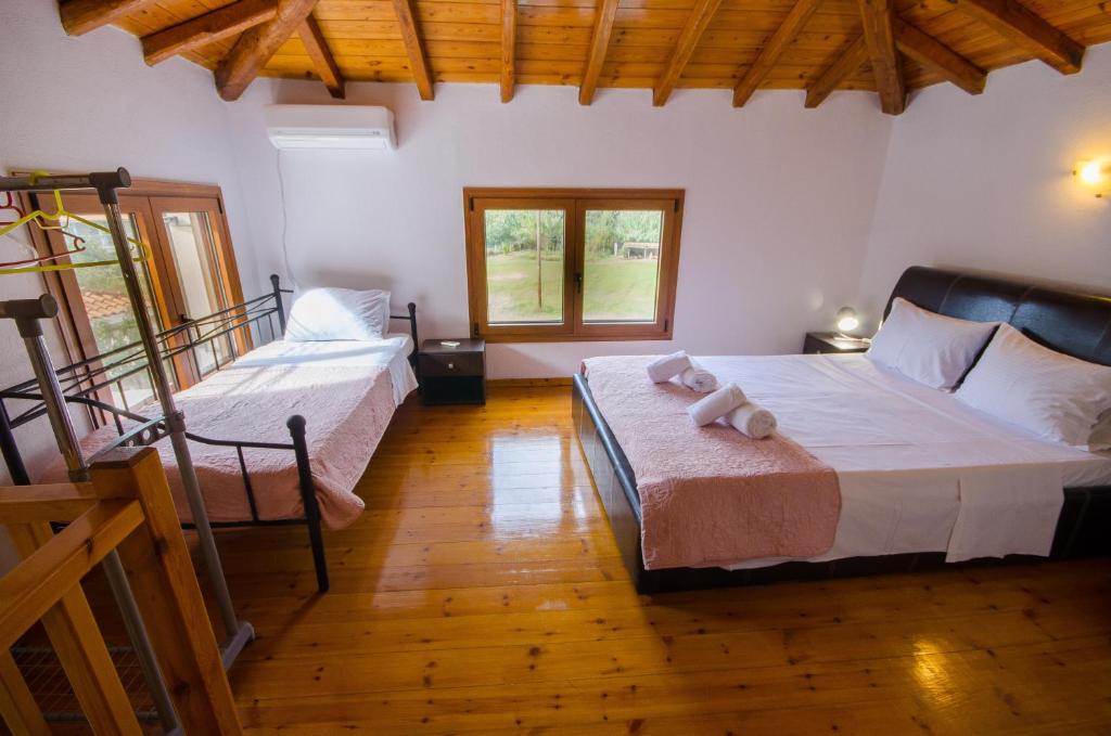 Posteľ alebo postele v izbe v ubytovaní Villa Louisa