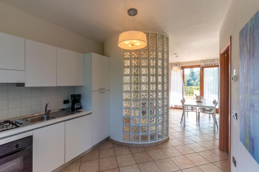 Kuchyň nebo kuchyňský kout v ubytování Residence Albarella