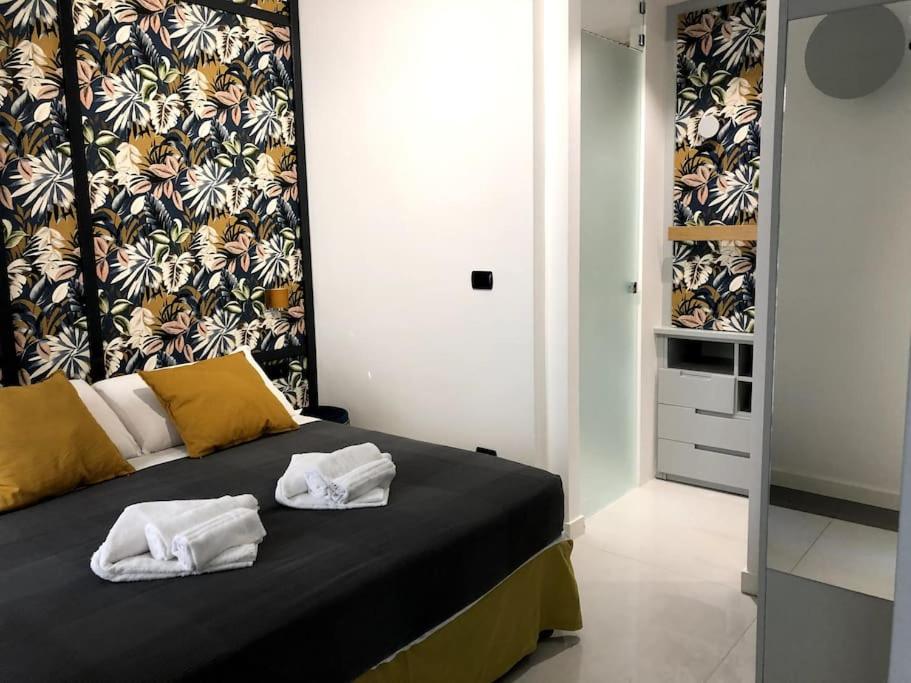 A bed or beds in a room at New Vite Apartment