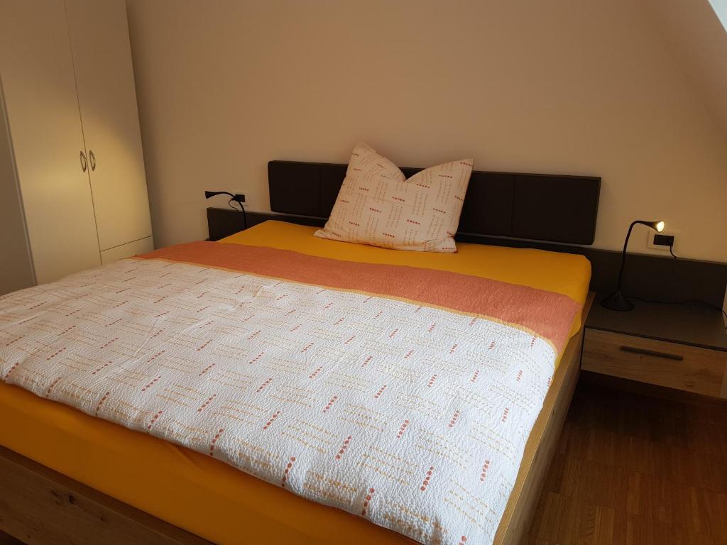 Łóżko lub łóżka w pokoju w obiekcie Hager Apartment 3