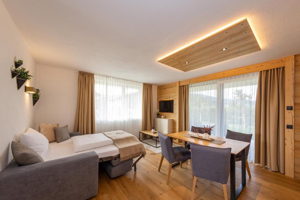 Posteľ alebo postele v izbe v ubytovaní FESH LIVING