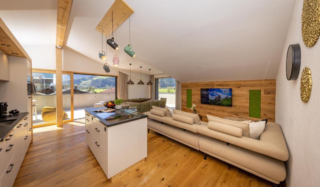 Televízia a/alebo spoločenská miestnosť v ubytovaní FESH LIVING