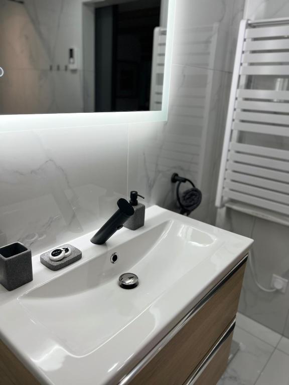 Kúpeľňa v ubytovaní Loft ravissant avec parking gratuit
