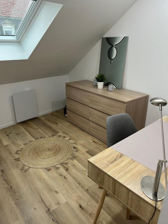 Posedenie v ubytovaní Loft ravissant avec parking gratuit