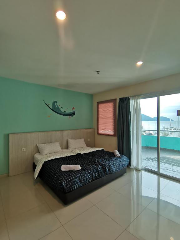 Peaceful 1-bedroom unit at Marina Island by JoMy Homestay - King Suite Con Vista Al Mar
