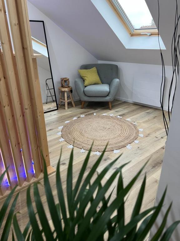 Posedenie v ubytovaní Loft ravissant avec parking gratuit