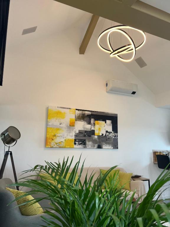 Posedenie v ubytovaní Loft ravissant avec parking gratuit