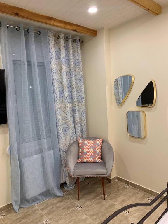 A seating area at Cute Corner In The Centre VIPGreece