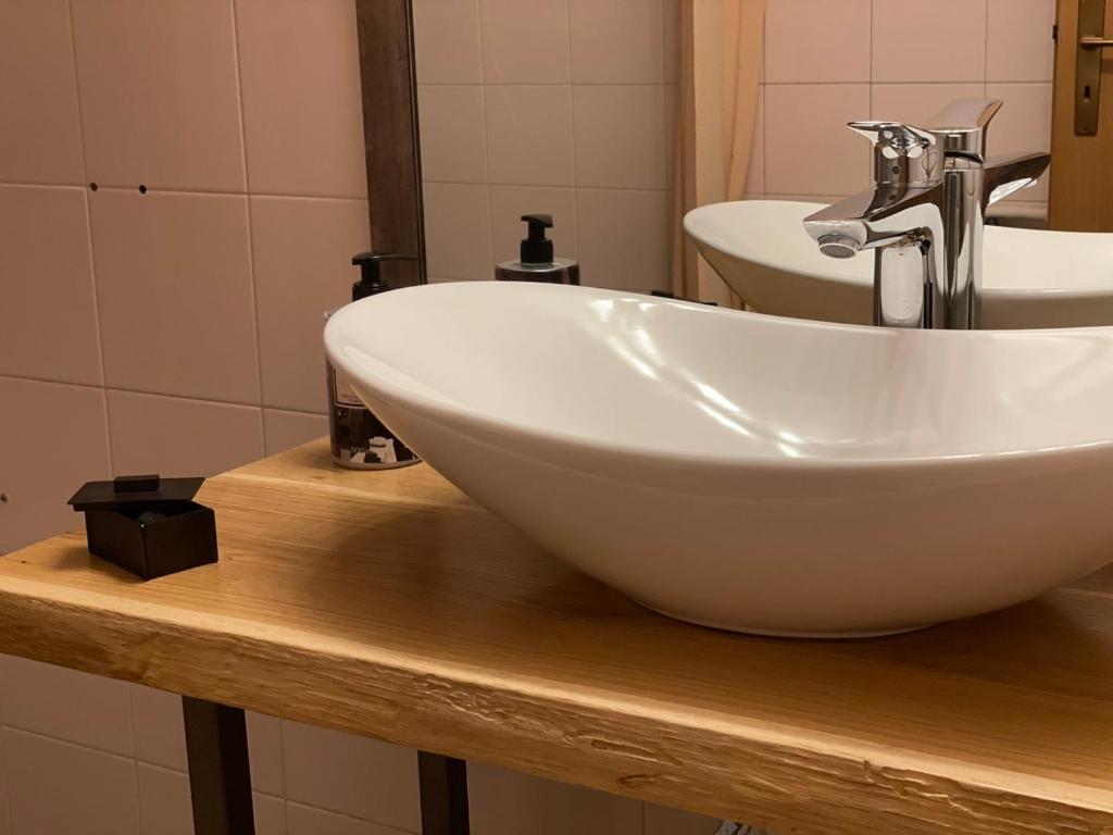 Vannituba majutusasutuses Corso Apartment