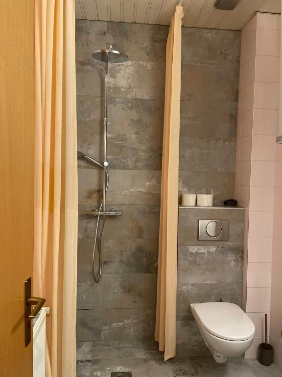 Vannituba majutusasutuses Corso Apartment