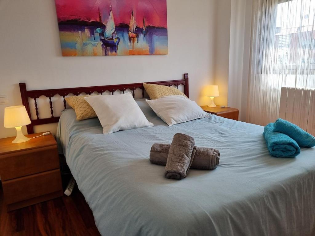 Łóżko lub łóżka w pokoju w obiekcie C01A03 Precioso apartamento Santander