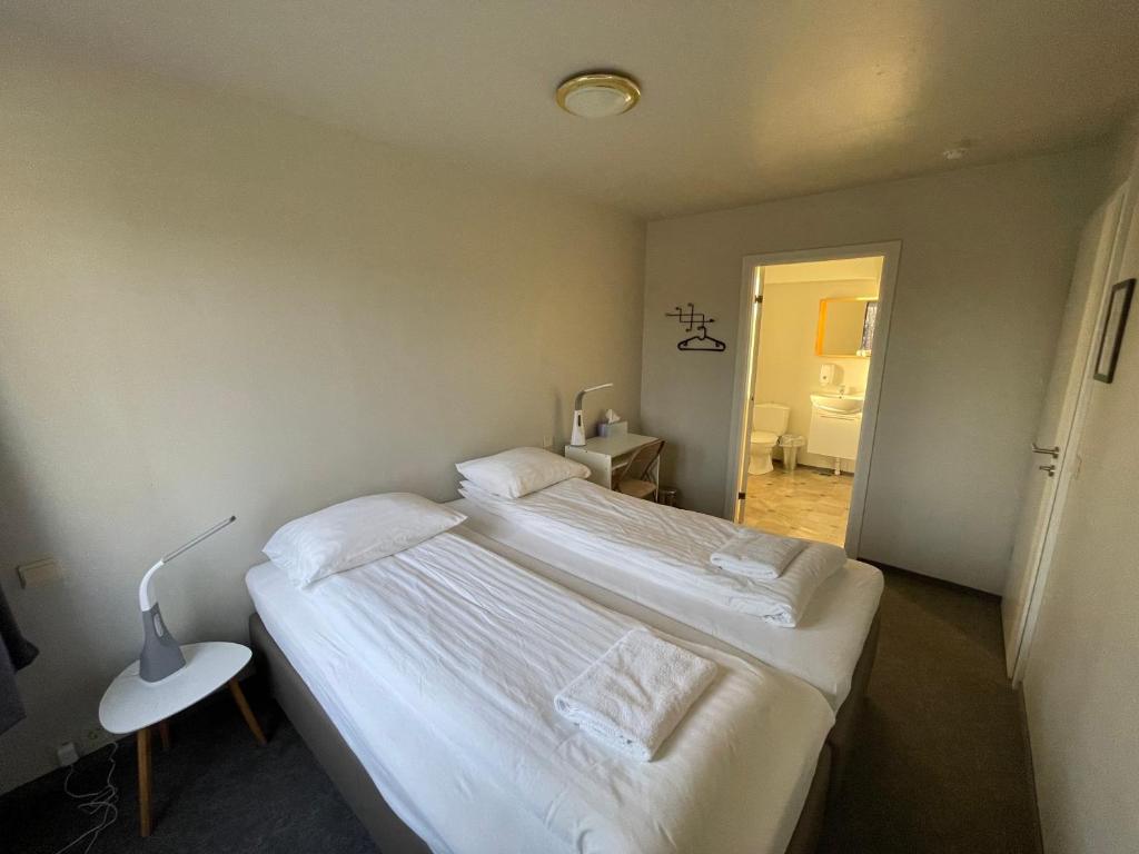 Postel nebo postele na pokoji v ubytování Guesthouse Bitra B&B