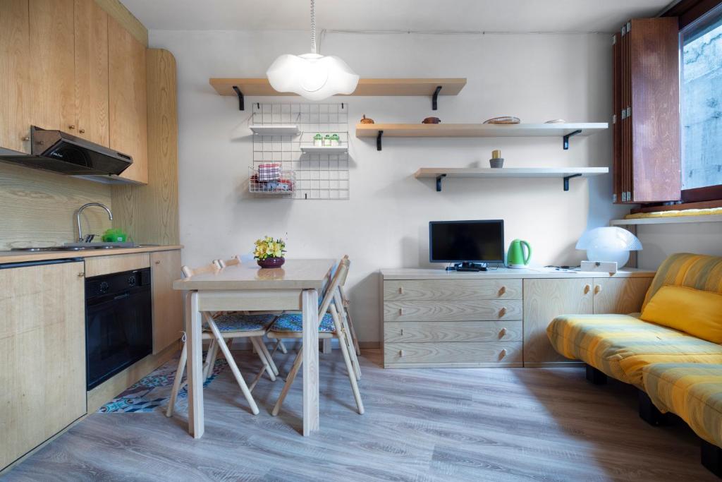 Telewizja i/lub zestaw kina domowego w obiekcie Condominio Escargot