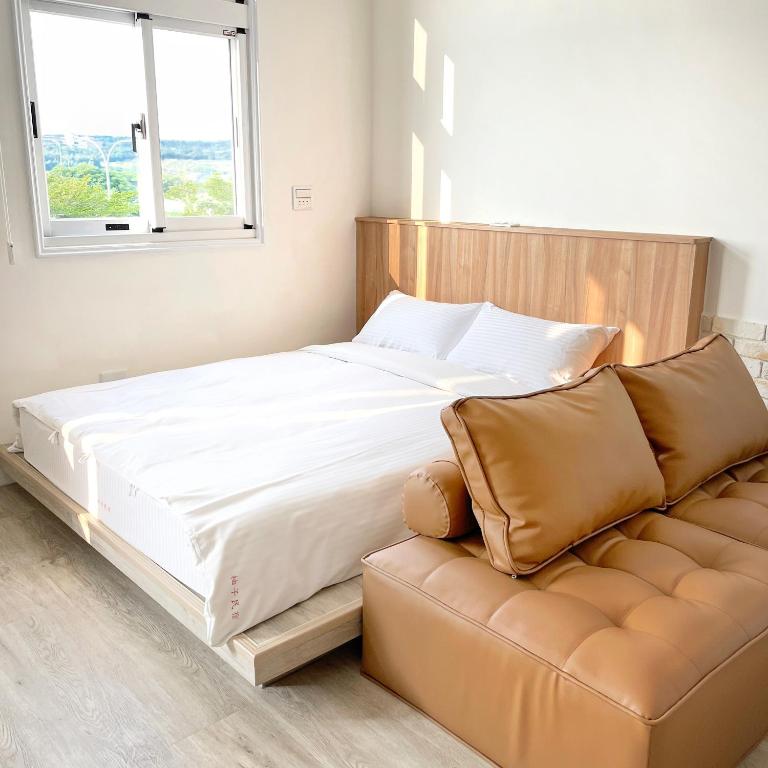 Postel nebo postele na pokoji v ubytování Pomelo Homestay